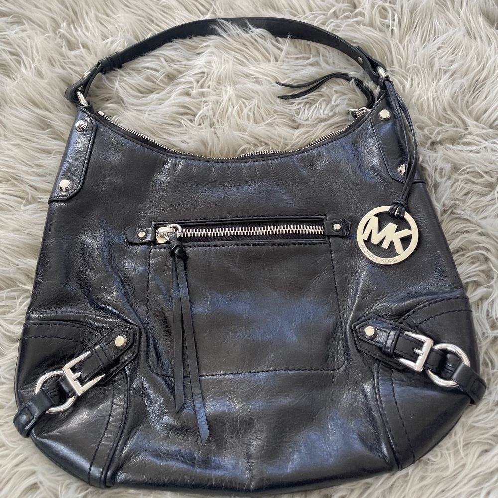 Michael Kors women’s black leather handbag